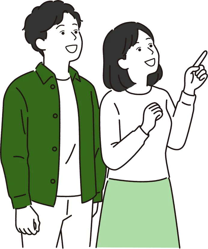 指をさす農家の夫婦
